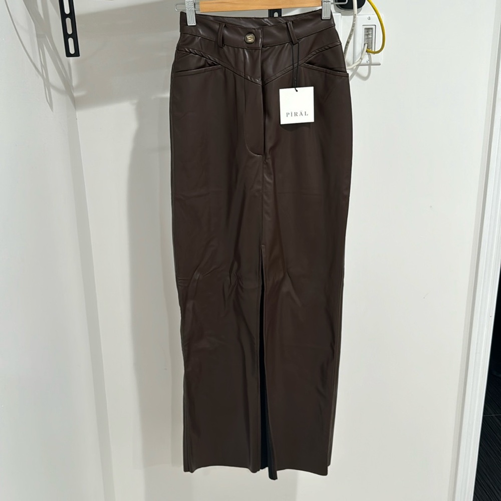 Faux leather maxi skirt with slit in the front.